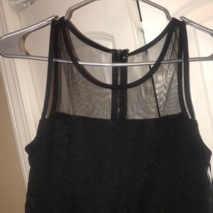 Black mini bodycon dress.